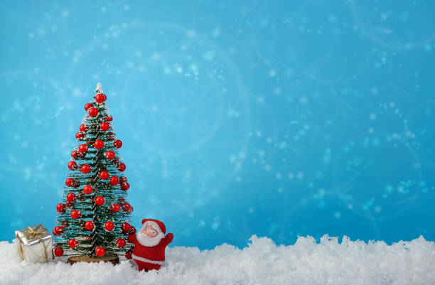 istock Decorative christmas tree with red balls and Christmas balls on blue. 1222831291