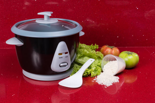 istock Electric rice cooker, in the kitchen red in modern home 1222831305