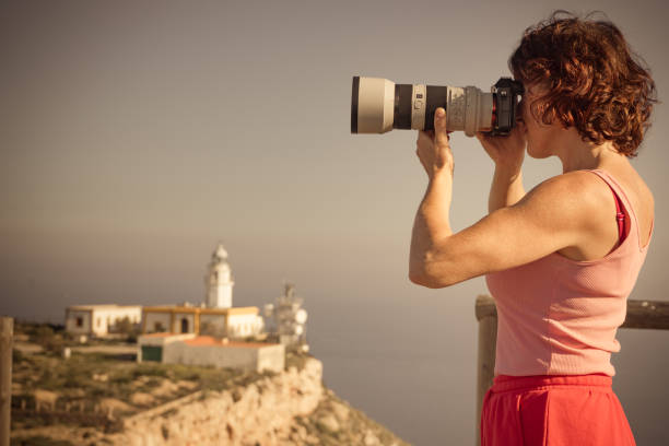 istock Tourist take photo at lighthouse, Cabo de Gata, Spain 1222832839