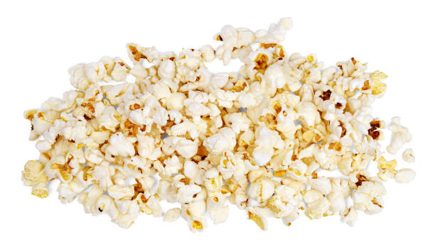 istock Pile of crunchy popcorn on white. 1222833335