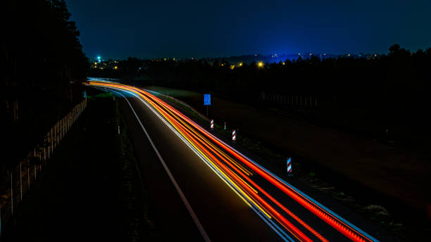 istock lights of cars with night 1222833607