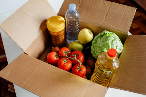 istock Close-up cardboard box with different fresh packed food products. 1222834256