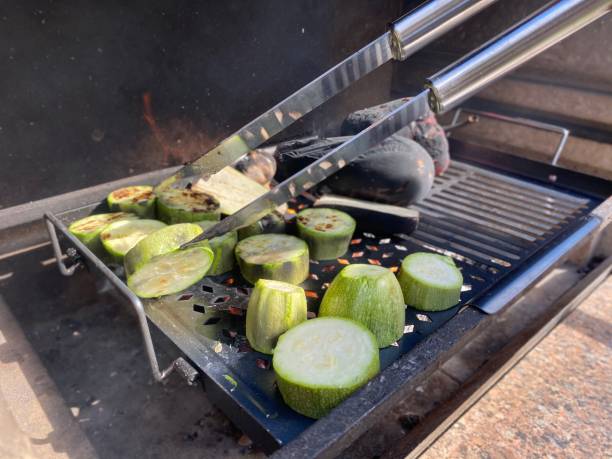 istock zucchini, eggplant, pepper, garlic grilled on a fire. Grill outdoor. 1222834329