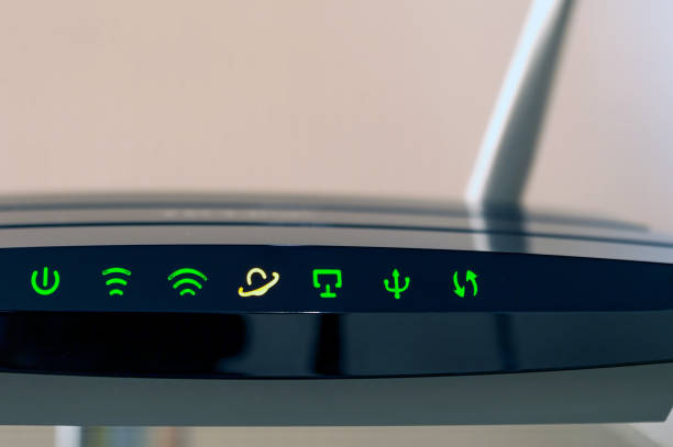 Switched-on wireless router closeup.