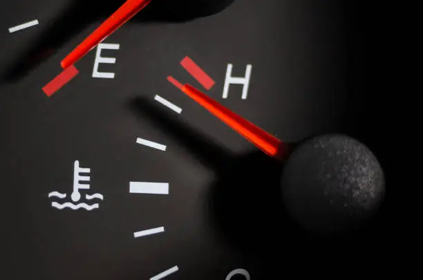 Photo of Car engine temperature sensor close up arrows