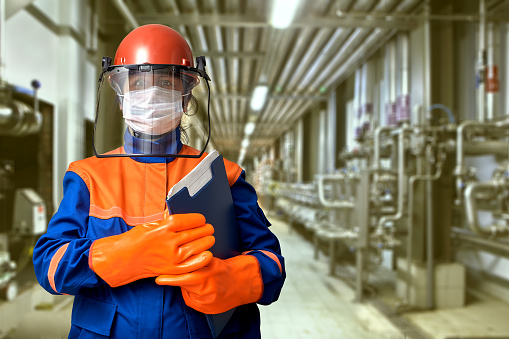 A protective gear or workwear for an industrial electrical engineer includes a face mask to protect against covid-19 coronavirus infection during a pandemic.