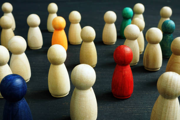 istock Small wooden figures. Social inclusion, diversity and equality concept. 1222846069