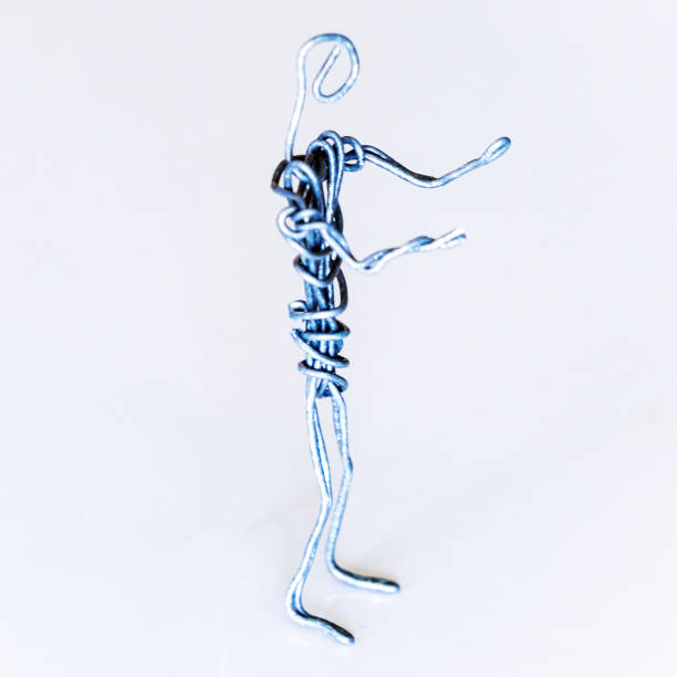 istock A man of wire stands gesturing with his hands, symbolizing conversation, proof 1222846977