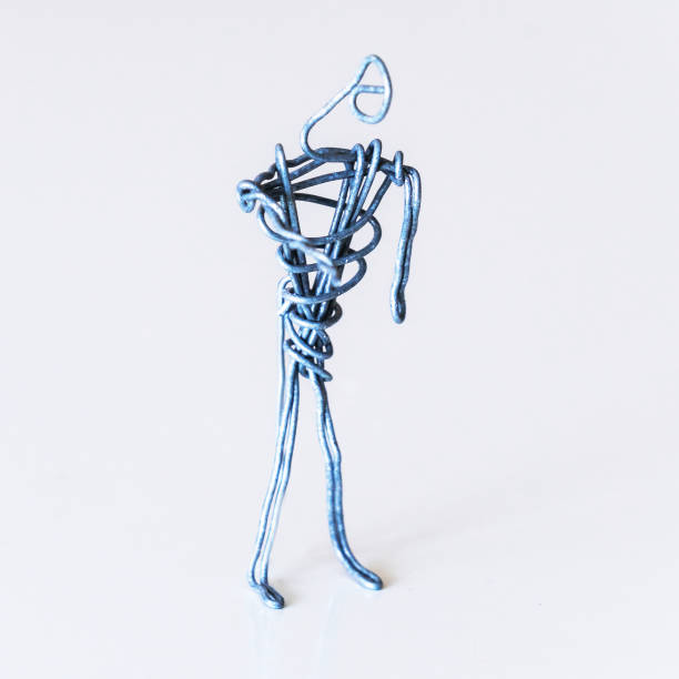 istock A man of wire stands with outstretched hand, symbolizing a request, begging, poverty 1222846979