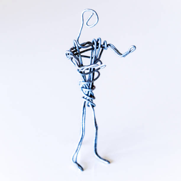istock A man of wire stands gesturing with his hands, symbolizing conversation, proof 1222846981
