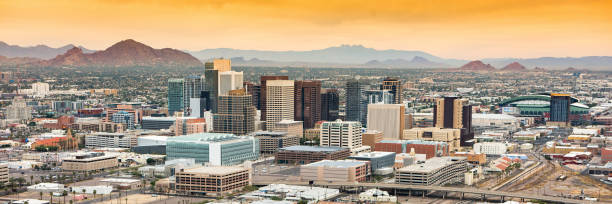 Panoramic aerial view of the Phoenix, Arizona Panoramic aerial view of the Phoenix, Arizona skyline against the day's blue sky. phoenix arizona stock pictures, royalty-free photos & images