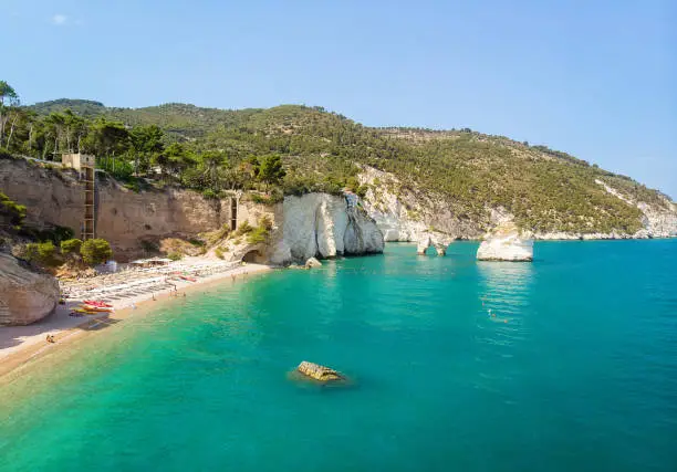 Italian coast - Baia delle Zagare beach, Gargano and Faraglioni (Rock formation eroded by waves) in Puglia, famous touristic destination