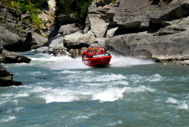 speeding jetboat Queenstown, New Zealand, 02/14/2011
speeding jet boat in shotover canyon in new Zealand's South Island jet boat stock pictures, royalty-free photos & images