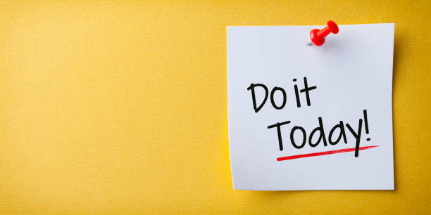 istock White Sticky Note With Do it Today And Red Push Pin On Yellow Background 1222858589