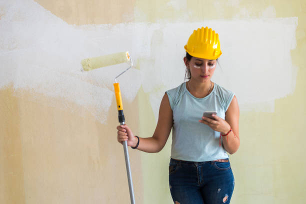 istock A young woman will do repairs at home 1222860174