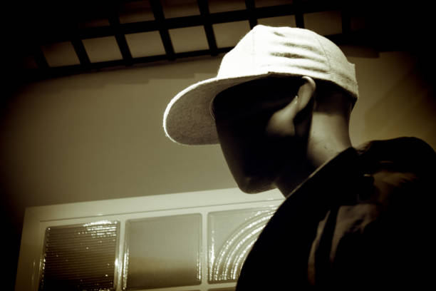 Close-up image of a mannequin of a young person with a hat