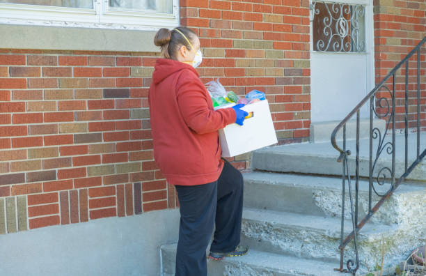 istock Woman Delivering Wearing An N95 Mask 1222861101