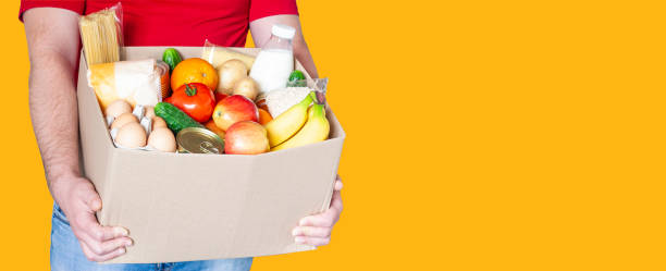 istock Food box in male hands 1222861282
