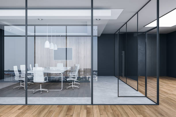 istock Modern meeting room interior with empty tv screen and sunlight. 1222862455