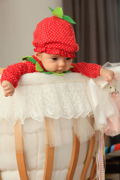 bambina vestita con abito fragola - well dressed front view looking at camera full length foto e immagini stock