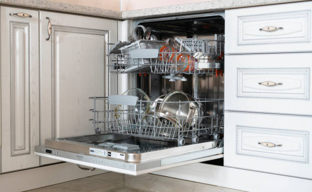 istock some dirty dish tableware on the tray in dishwasher machine in the kithcen 1222865592