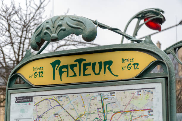 Pasteur metro station sign in Paris Paris, France - February 09 2020: Pasteur metro station sign in Paris pasteur institute stock pictures, royalty-free photos & images