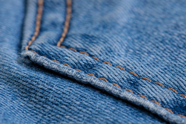 istock jeans pocket pants closeup with orange thread 1222866492