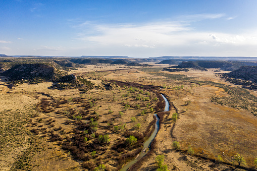A beautiful drone photo of Comanche National Grassland.  A vast canyon filled with prehistoric artifacts