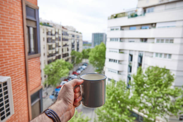 Boy celebrates his neighbors birthday with a coffee over confinement