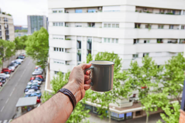 istock Boy celebrates his neighbors birthday with a coffee over confinement 1222870983