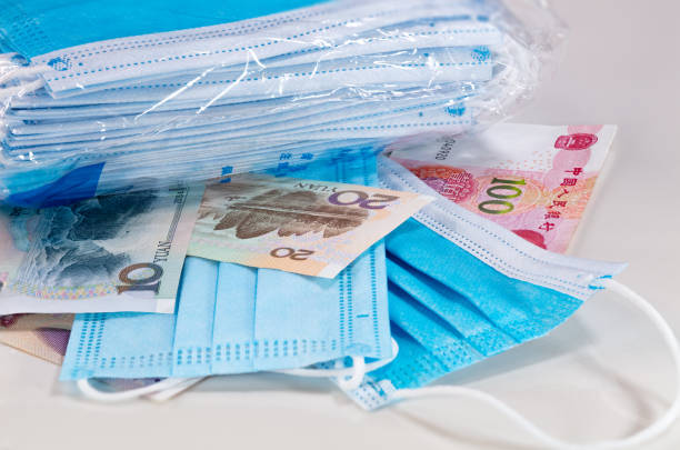 istock Chinese yuan with face mask 1222877504