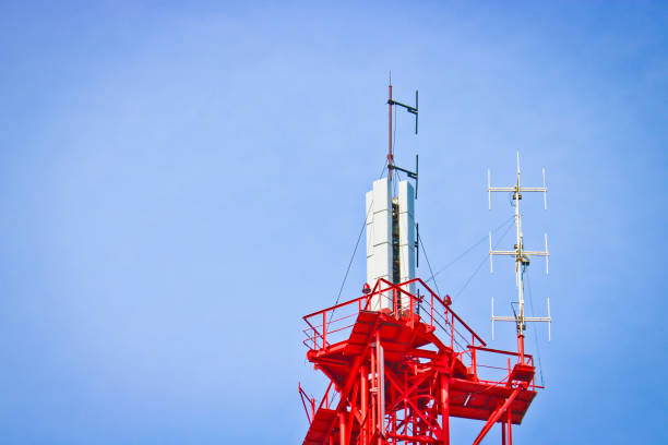 istock Cellular antenna and telecommunications against the blue sky. Copy space. 1222879355