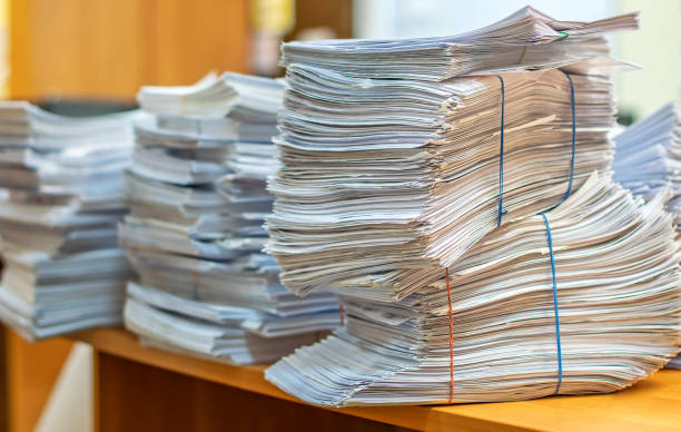 istock pile of paper documents in the office 1222880016