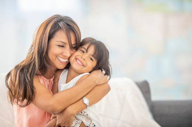 istock Mother and daughter snuggling 1222880722