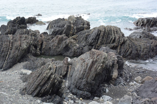 istock Sedimentary rock rising from the sea floor 1222885624