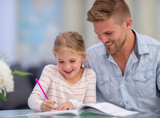 istock Parent and child homeschooling 1222887749