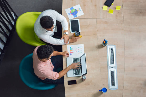 istock colleagues are working at the company desk so they work 1222889691