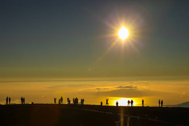 Haleakala Volcan, Maui, Hawaii.\nHaleakalā, or the East Maui Volcano, is a massive shield volcano that forms more than 75% of the Hawaiian Island of Maui. The tallest peak of Haleakalā, at 10,023 feet, is Puʻu ʻUlaʻula