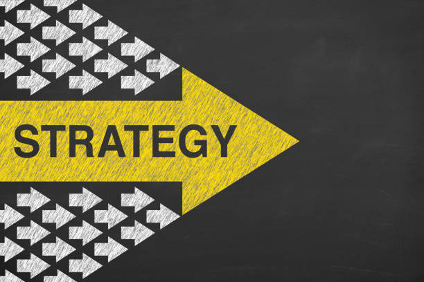 Strategy Concepts with Arrows on Chalkboard Background