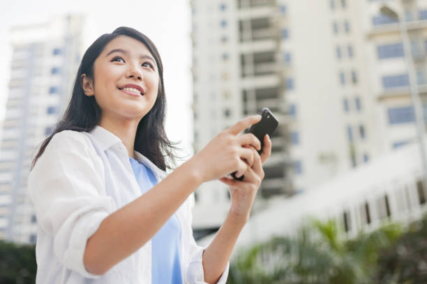 istock Young woman with a smartphone 1222890535