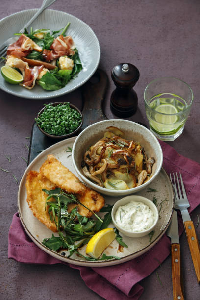 istock Chicken Milanese with Crispy Potatoes and Rocket 1222891468