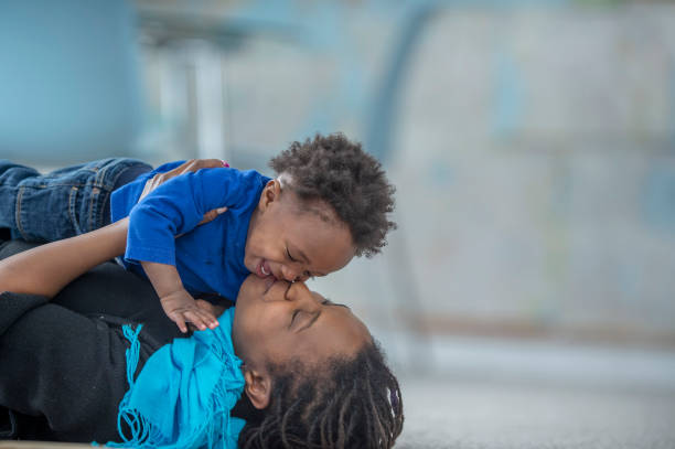 istock Mother and toddler son having fun together 1222893276