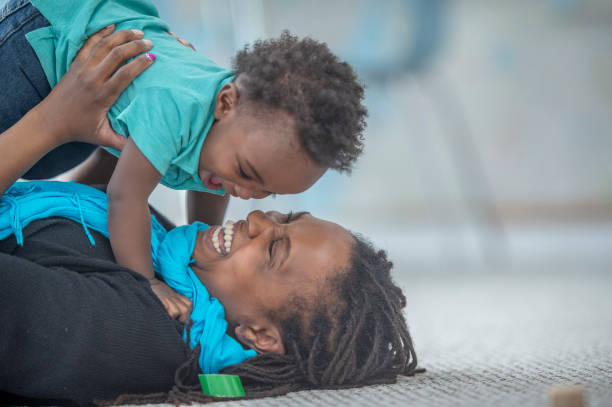 istock Mother and toddler son having fun together 1222893283