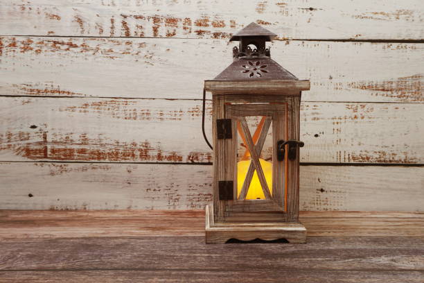 istock Wooden Lantern Decoration with space copy on wooden background 1222901825
