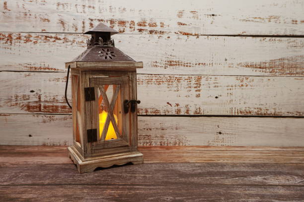 istock Wooden Lantern Decoration with space copy on wooden background 1222901842
