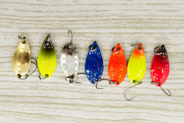 istock old oscillating lures on the caumuflage background 1222905518