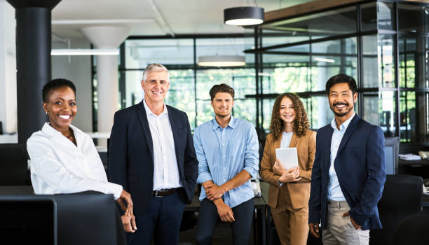 istock Portrait of smiling multi-ethnic professionals 1222911432