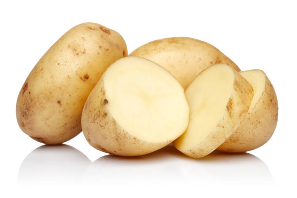 istock Fresh potatoes with slices isolated 1222912844