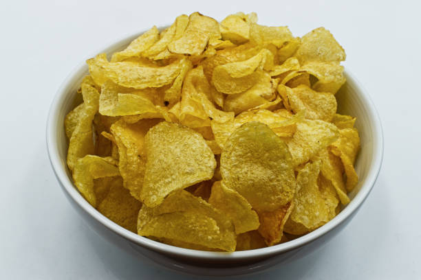 istock Crisps in bowl, potato chips, isolated on white 1222915084