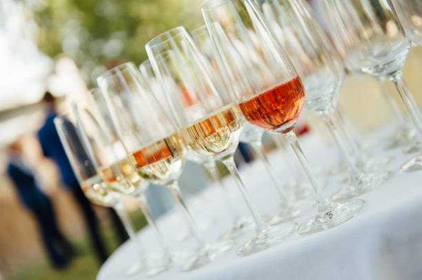 istock A row of empty champagne glasses on table. Banquet setting 1222916122